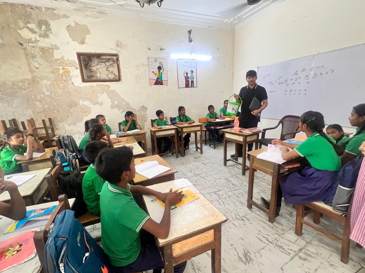 Children learning about battery safety at Udaan